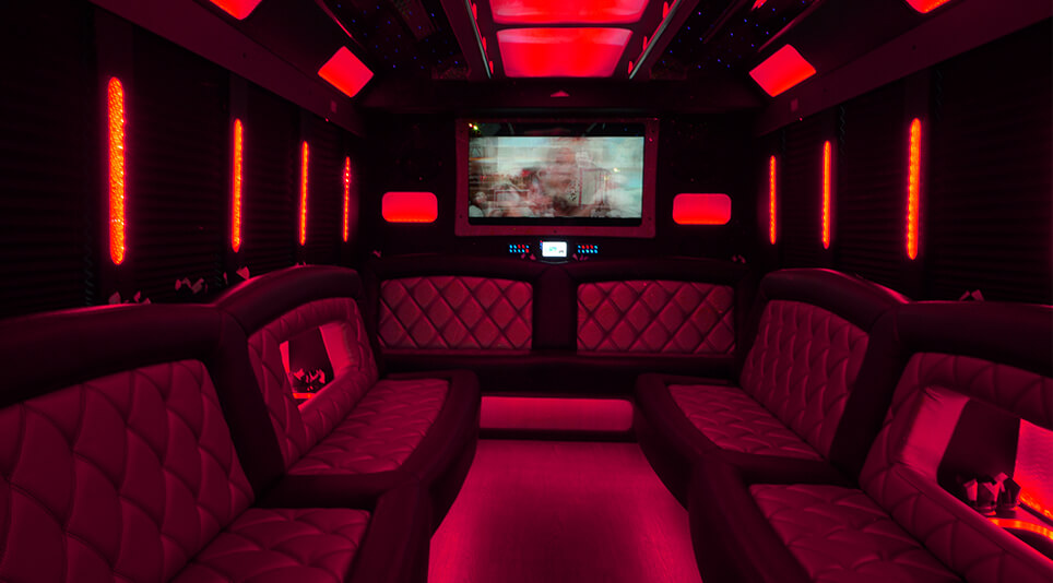 Party bus interior with bright red lighting
