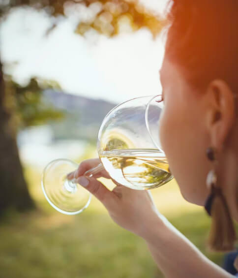 woman tasting wine